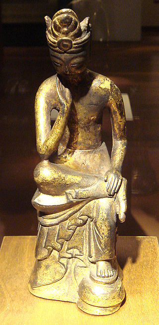 Tượng Di Lặc ngồi, nghệ thuật Hàn Quốc, thế kỷ 4-5. Hiện vật Bảo tàng Guimet.